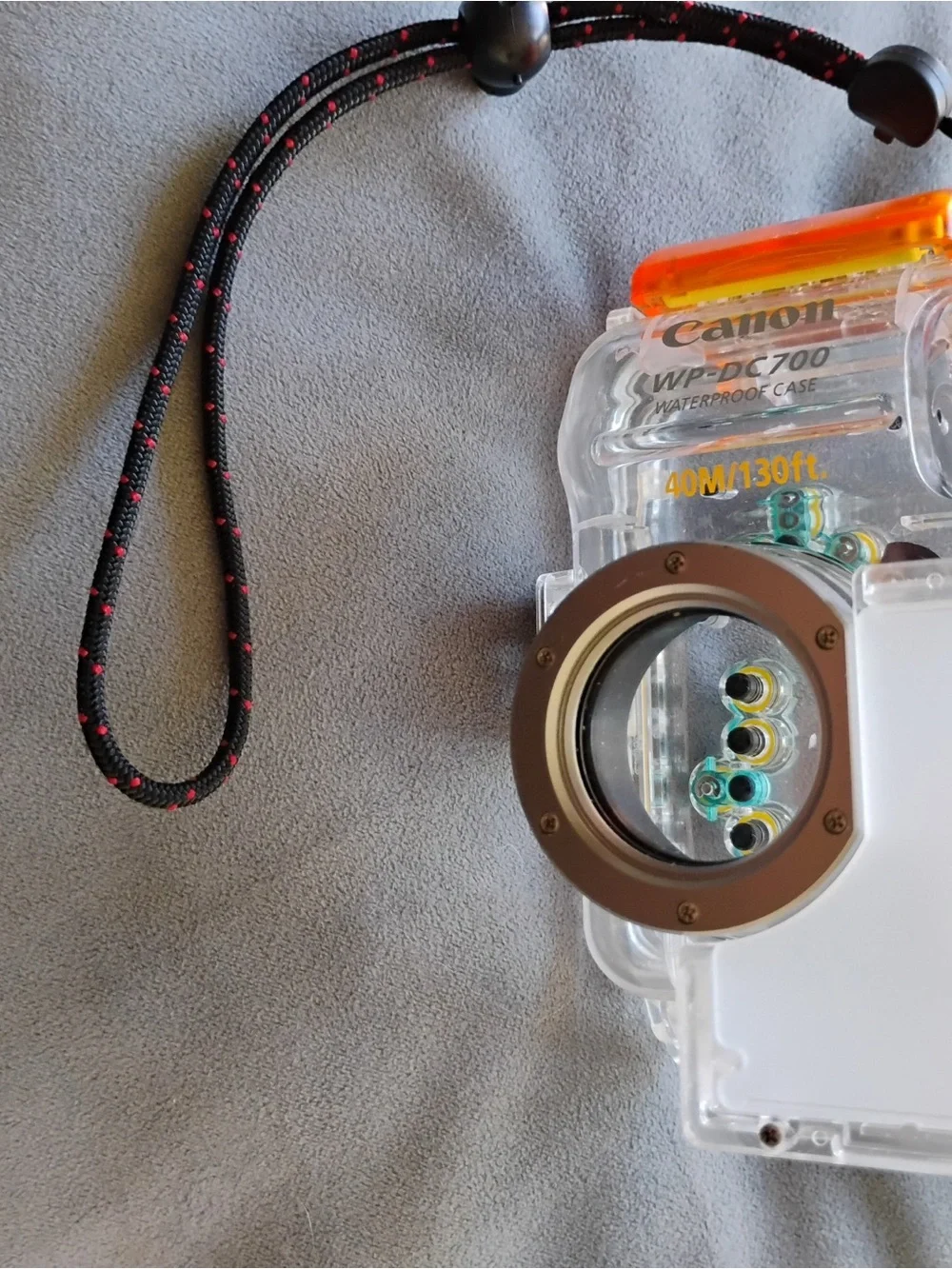 Clear Waterproof Canon WP-DC700 Camera Case with Teal Controls